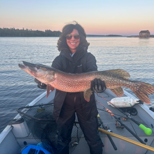 2063uidAngler_with_nice_pike_Sunset_Lodge.jpg